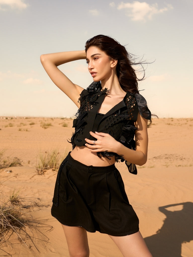 Black denim shorts with beaded