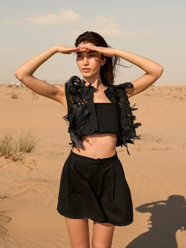 Black denim shorts with beaded